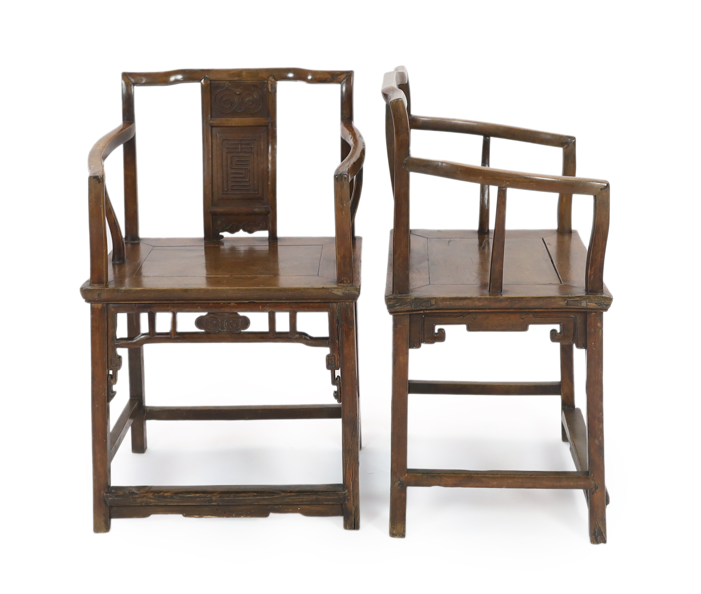 A pair of Chinese walnut armchairs, 19th century